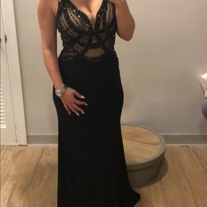 Black long dress by Sean Collection.